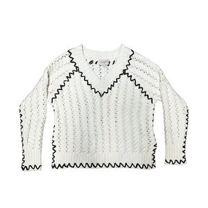 Elegant V-Neck Sweater with Black Accents